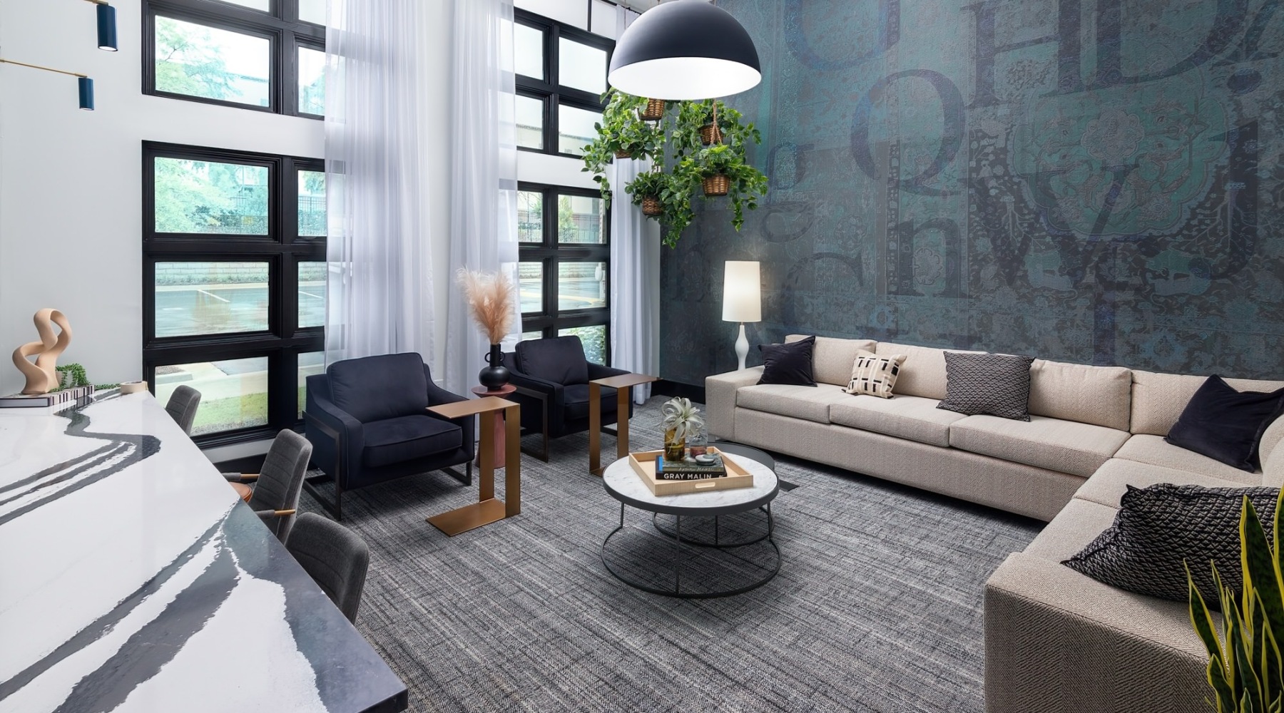 a spacious lounge with a large window